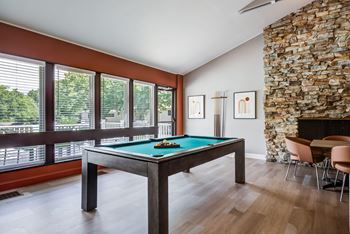 Clubhouse with great room for resident functions - with fireplace, large-screen tv, & kitchen!